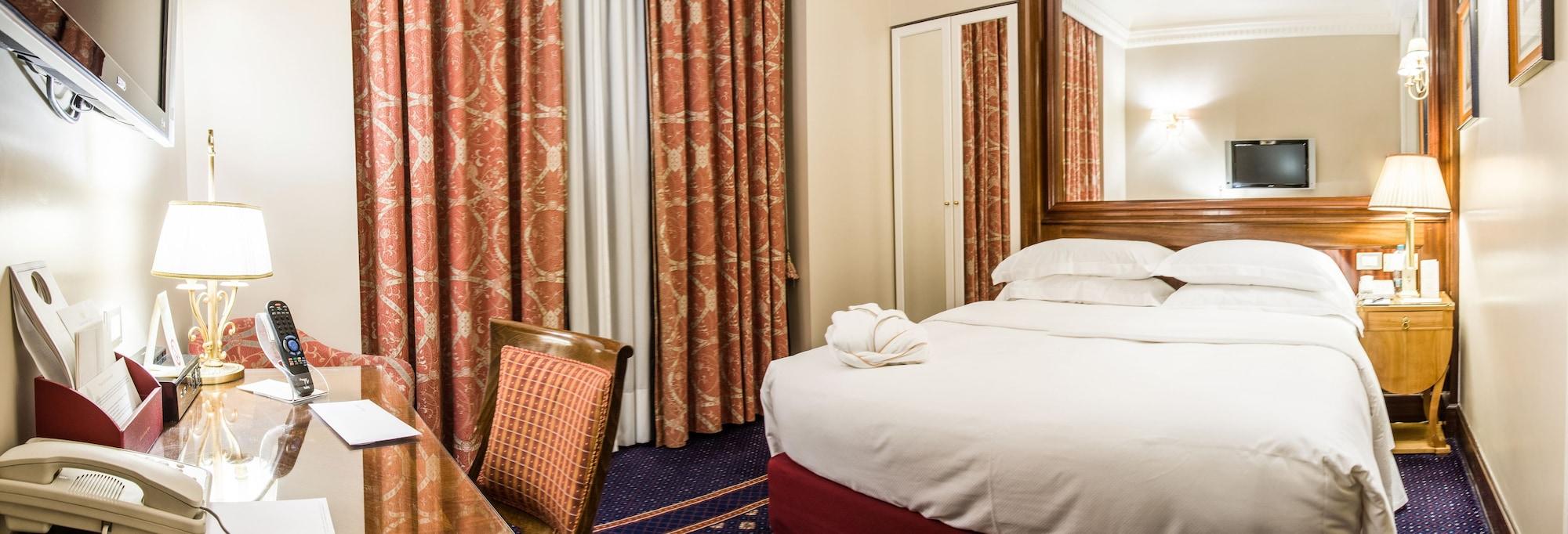 Grand Hotel Sitea Torino Esterno foto A bedroom in the hotel