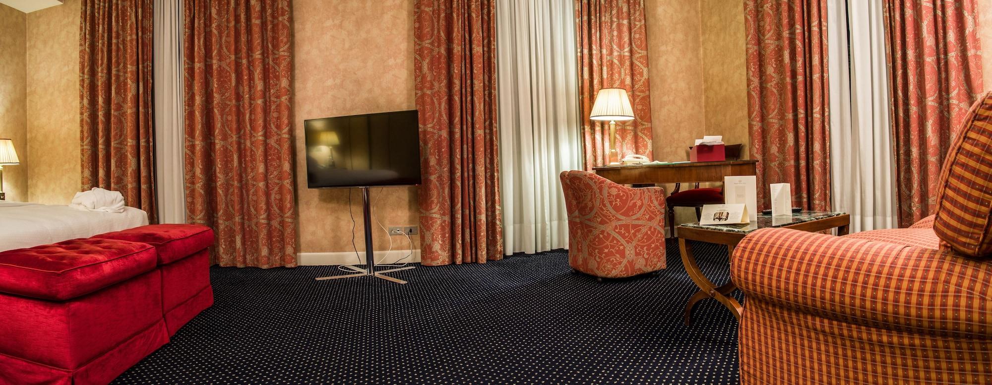 Grand Hotel Sitea Torino Esterno foto A room with carpet