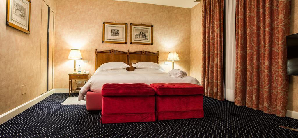 Grand Hotel Sitea Torino Esterno foto A room at the hotel
