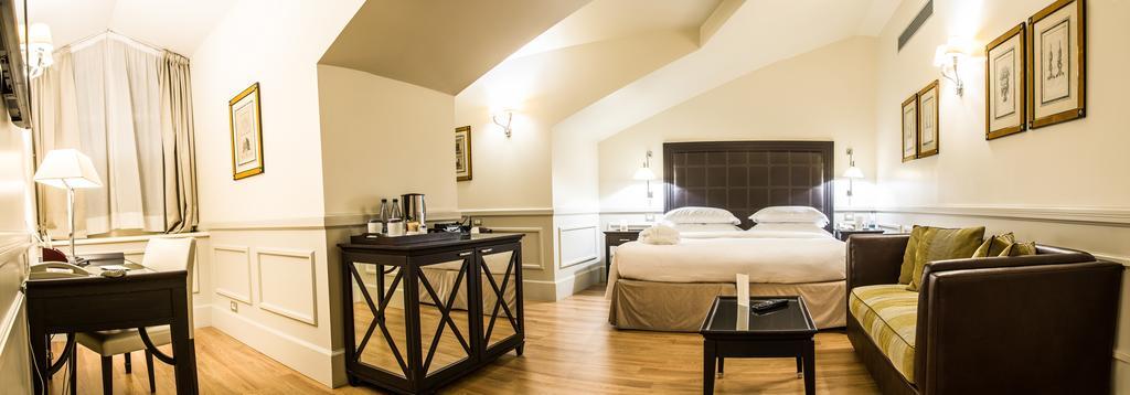 Grand Hotel Sitea Torino Esterno foto A room at the hotel