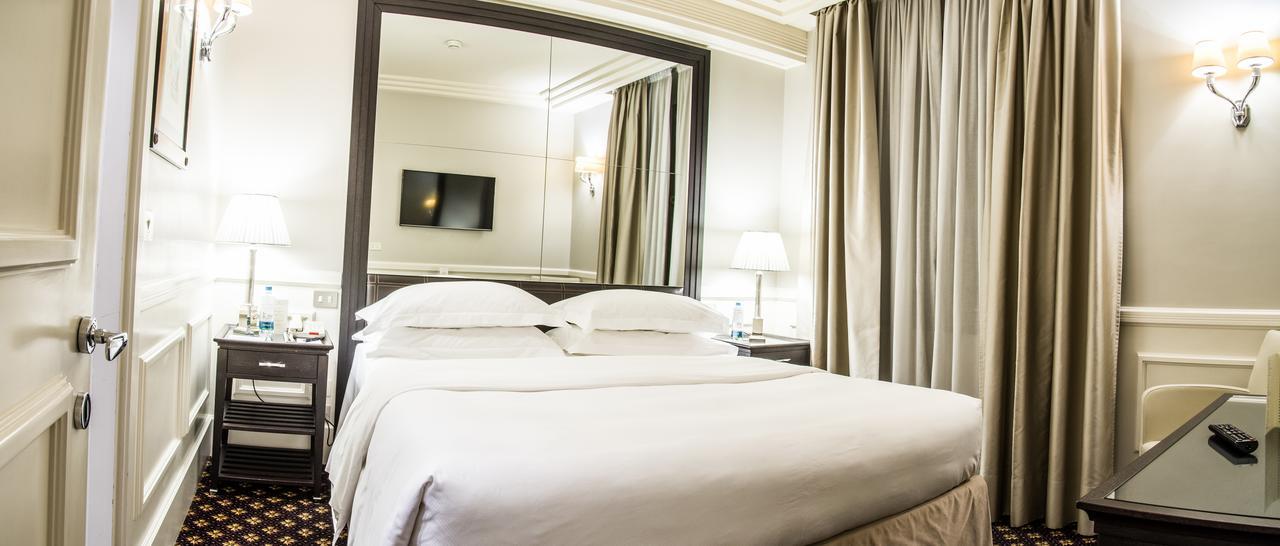 Grand Hotel Sitea Torino Esterno foto A bedroom at the hotel
