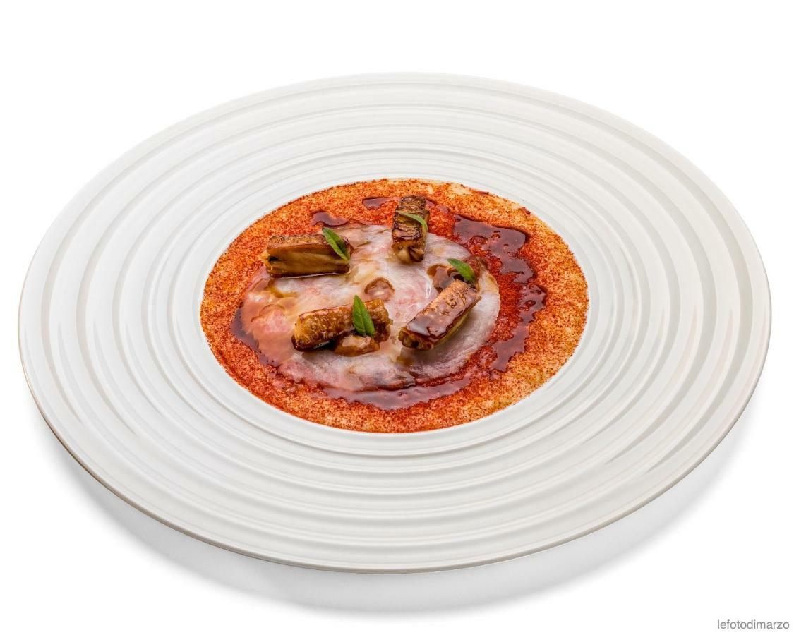 Grand Hotel Sitea Torino Esterno foto A plate of pizza
